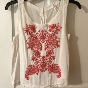 White crop top with floral designs